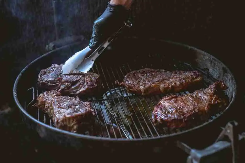 steak in cast iron skillet in oven